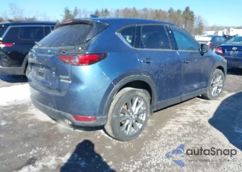 2021 Mazda Cx-5 Grand Touring z USA, uszkodzony, nr VIN JM3KFBDM2M0430626